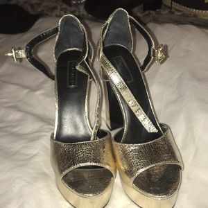 Brand new gold platform heels size 7!